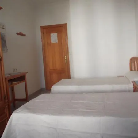 Casa De Huespedes El Almendro בית הארחה